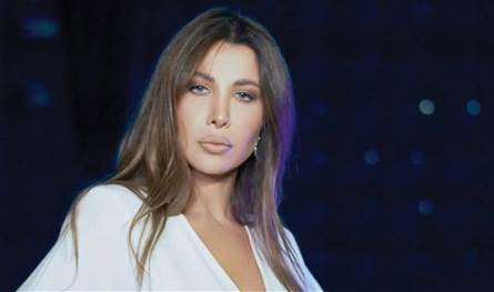 &quot;احكيلهم إنك بتحبيني&quot;.. معجب ينهار بعد صعوده إلى المسرح مع نانسي عجرم (فيديو)